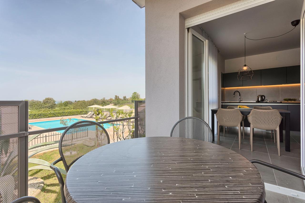 One-Bedroom Apartment with Balcony and Garden View,645789357:JPEG